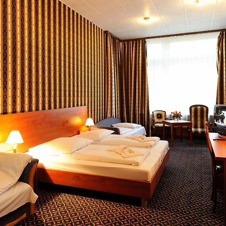 City Hotel Am Kurfuerstendamm Berlim Quarto foto
